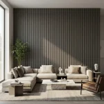 Dark grey acoustic slat wood panels installed as a full feature wall in a modern living room with sectional sofa.